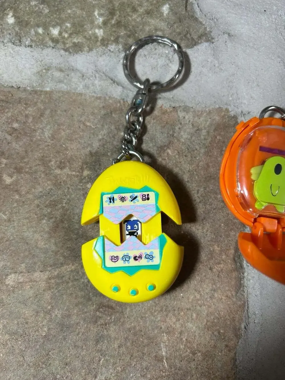 McDonalds Tamagotchi Keychains Orange and Yellow